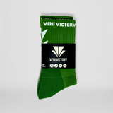 Verpackte Gripsocks / Fussballsocken / Footballsocks in grün mit weissen rutschfesten Gummipads / Gumminoppen für besseren Halt beim Sport.