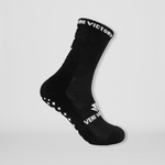 Fussballsocken in schwarz mit rutschfesten Gumminoppen in Kreuzform für besseren Halt in allen Sportarten.