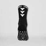 Gripsocks in schwarz mit weissen Pfeilen, rutschfesten Gumminoppen und verstärkter Ferse für besseren Halt und maximalen Komfort beim Sport.